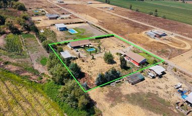 SE VENDE PROPIEDAD CON 2 CASAS EN SANTA RITA, PELARCO.