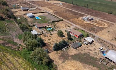SE VENDE PROPIEDAD CON 2 CASAS EN SANTA RITA, PELARCO.