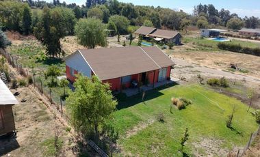 SE VENDE PROPIEDAD CON 2 CASAS EN SANTA RITA, PELARCO.
