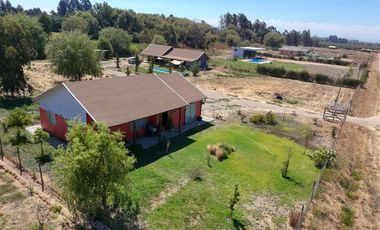 SE VENDE PROPIEDAD CON 2 CASAS EN SANTA RITA, PELARCO.