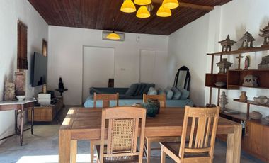 A beautiful semi-furnished villa with a small river, paddy fields and sunset view