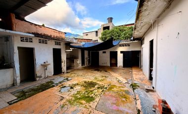 CASA LOTE A DOS CUADRAS UNIVERSIDAD DE IBAGUE BARRIO AMBALA CERCA AV