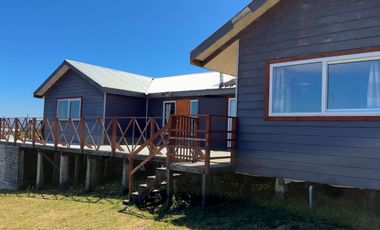 Parcela en venta con 2 casas a 500 metros del asfalto en Estaquilla