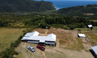 Parcela en venta con 2 casas a 500 metros del asfalto en Estaquilla