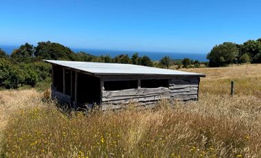 Parcela en venta con 2 casas a 500 metros del asfalto en Estaquilla