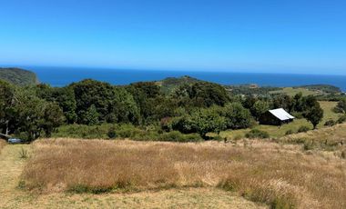 Parcela en venta con 2 casas a 500 metros del asfalto en Estaquilla