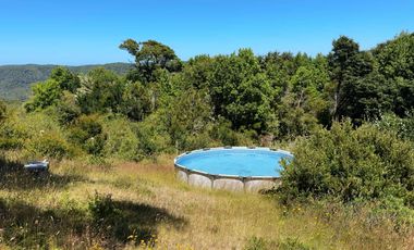 Parcela en venta con 2 casas a 500 metros del asfalto en Estaquilla