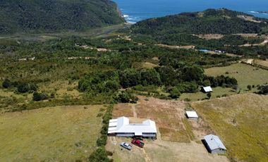 Parcela en venta con 2 casas a 500 metros del asfalto en Estaquilla