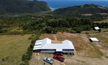 Parcela en venta con 2 casas a 500 metros del asfalto en Estaquilla