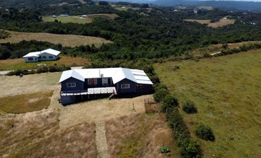 Parcela en venta con 2 casas a 500 metros del asfalto en Estaquilla