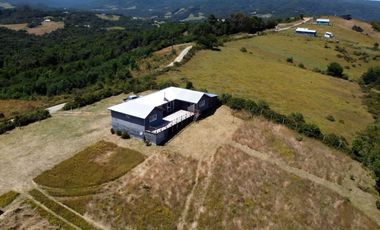 Parcela en venta con 2 casas a 500 metros del asfalto en Estaquilla