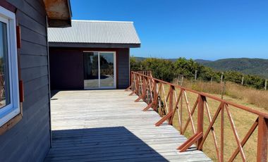 Parcela en venta con 2 casas a 500 metros del asfalto en Estaquilla