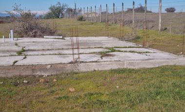 PARCELA PLANA EN MARCHIGUE, CON RADIER DE 160 MTRS2, SE ENTREGA CON AGUA