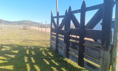 PARCELA PLANA EN MARCHIGUE, CON RADIER DE 160 MTRS2, SE ENTREGA CON AGUA