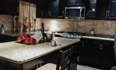 casa con negocio en funcionamiento