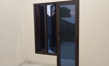 Hunian dlm cluster cakep dipinggir jalan raya utama jatiwarna lokasi dekat tol JORR jatiwarna