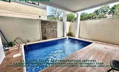 4 Bedrooms House with Pool For Rent Located inside a secured subdivision in Barangay Pampang,Angeles City,Pampanga