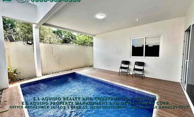 4 Bedrooms House with Pool For Rent Located inside a secured subdivision in Barangay Pampang,Angeles City,Pampanga