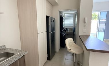 Departamento en planta baja con amplio jardin