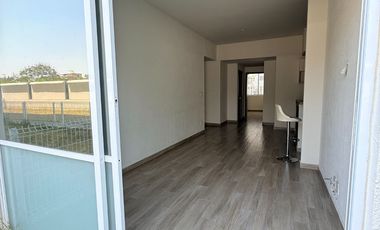 Departamento en planta baja con amplio jardin