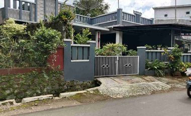 rumah pinggir jln