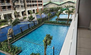 Furnished 2- bedroom unit , facing the Amenities at Fairlane Kapitolyo