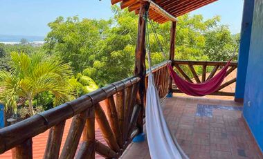 Bella Casa vista al mar sobre Loma