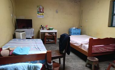 Se vende casa como terreno a dos cuadras de la Plaza de Armas de La Banda de Shilcayo.