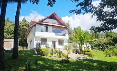 SE VENDE TERRENO CON CASA DE CAMPO EN OXAPAMPA CON VISTA Y SALIDA AL RIO CHOROBAMBA Y CON PARCELA AGRICOLA