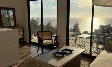 sitio con preciosa cabaña con vista panorámica al mar