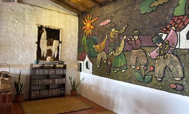 Venta de 17.800 m2 de terreno con 7 casas en Otavalo, apto para hostería
