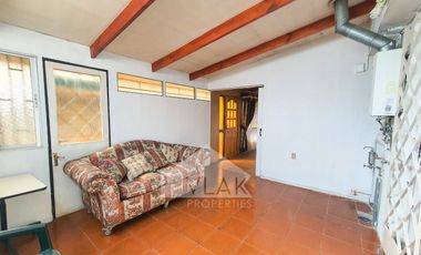 CASA CON GRAN POTENCIAL AMPLIO TERRENO LAS CONDES