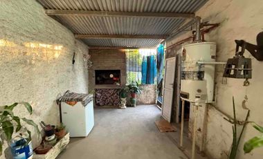CASA CON GRAN TERRENO Y COCHERA DOBLE APTA A CREDITO HIPOTECARIO SANTO TOMÉ