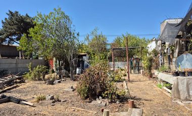 Se vende propiedad con casa dos pisos calle avenida Adrián Sector Artificio La calera