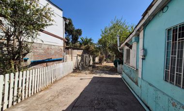 Se vende propiedad con casa dos pisos calle avenida Adrián Sector Artificio La calera