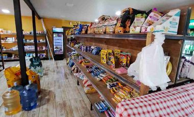 Gran oportunidad amplia y hermosa parcela con casa y local comercial ubicado en Quillón