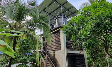 Ecolodge en Venta en Palomino, 100 metros de frente de playa, Colombia