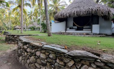 Ecolodge en Venta en Palomino, 100 metros de frente de playa, Colombia