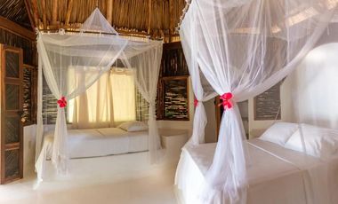 Ecolodge en Venta en Palomino, 100 metros de frente de playa, Colombia