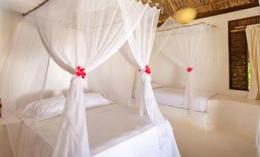 Ecolodge en Venta en Palomino, 100 metros de frente de playa, Colombia