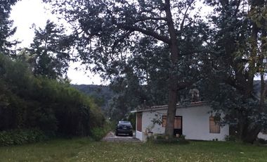 VENDO PROPIEDAD CAMPESTRE DE 4.5 Has. CON BOSQUE, RIO Y GRAN VISTA A LAS MONTAÑAS.