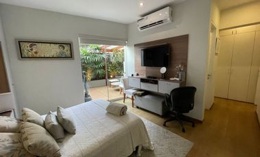 Alquilo exclusivo departamenti amoblado con jardín y terraza en primer piso