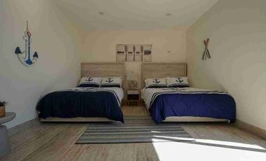 DESARROLLO EN LA PLAYA DE TELCHAC, CASA FRENTE AL MAR