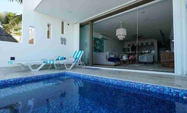 DESARROLLO EN LA PLAYA DE TELCHAC, CASA FRENTE AL MAR