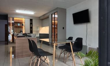 Propiedad comercial en venta con dos entradas, sobre la Autopista Rumiñahui, parqueadero para 20 vehículos, Valle de Los Chillos, Quito