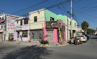 Amplia casa con local en esquina
