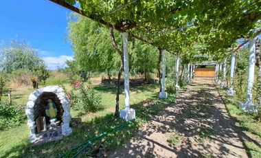 🏡 ¡OPORTUNIDAD! Hermosa Parcela de 7.400 m² con Casa y Derechos de Agua