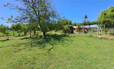 🏡 ¡OPORTUNIDAD! Hermosa Parcela de 7.400 m² con Casa y Derechos de Agua