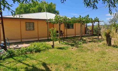 🏡 ¡OPORTUNIDAD! Hermosa Parcela de 7.400 m² con Casa y Derechos de Agua