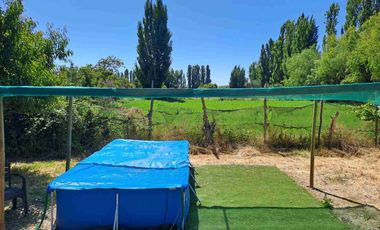 🏡 ¡OPORTUNIDAD! Hermosa Parcela de 7.400 m² con Casa y Derechos de Agua